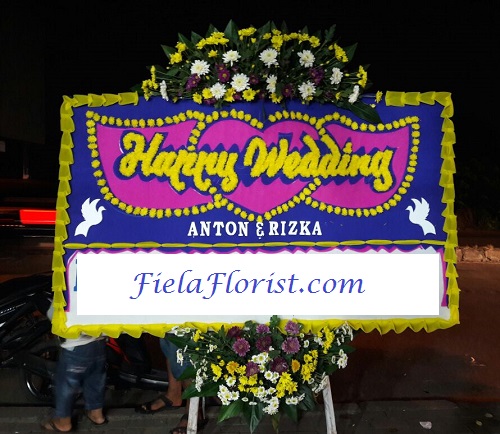 Jual bunga papan wedding FF - 027 untuk anda yang ingin memberi ucapan kepada kolega maupun saudara anda.